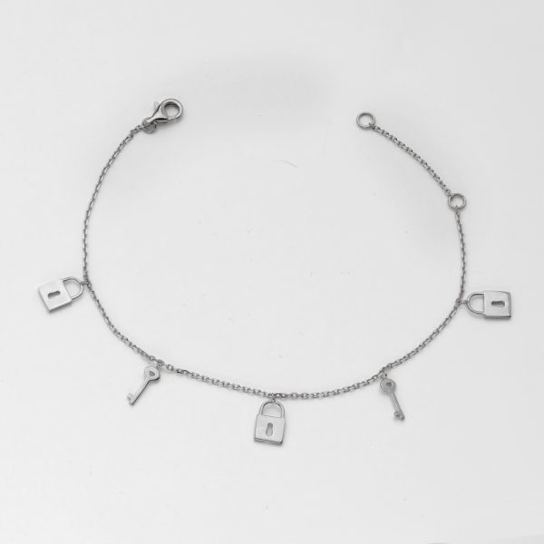 14KW 0.30CTW DIAMOND LOCK AND KEY CHARM BRACELET