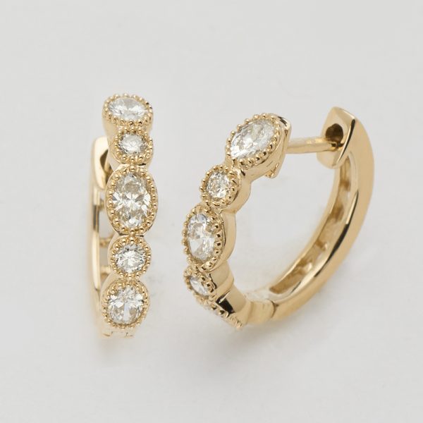 14KY 0.80CTW OVAL AND ROUND DIAMOND BEZEL SET HOOP